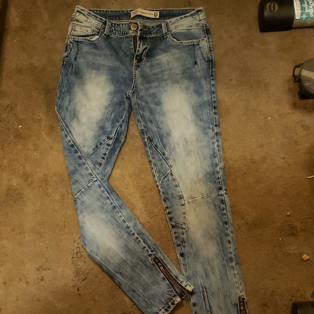 VELVET HEART "Stone-washed" jeans. There are zippers around each pant leg, ankle